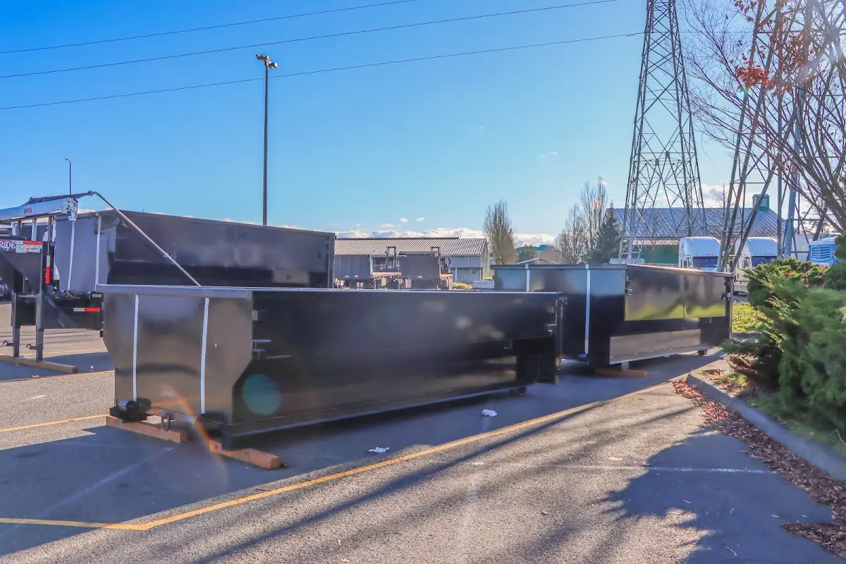 Roll-off dumpster ready for waste disposal at job site for Roofing Dumpster Rental in Coshocton